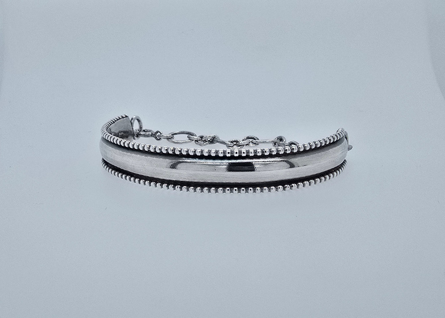Zilveren armband, half massief en half ketting.