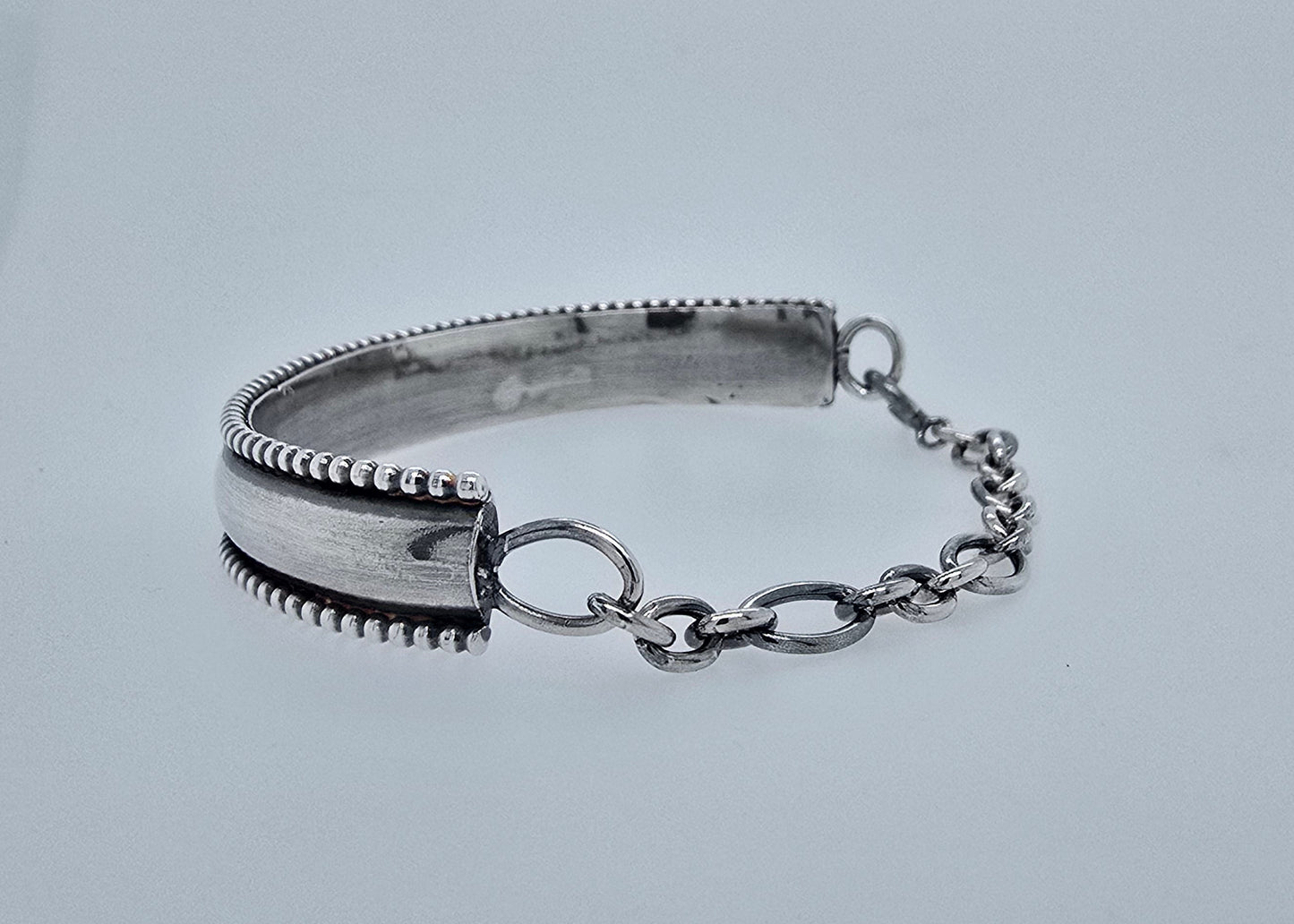 Zilveren armband, half massief en half ketting.