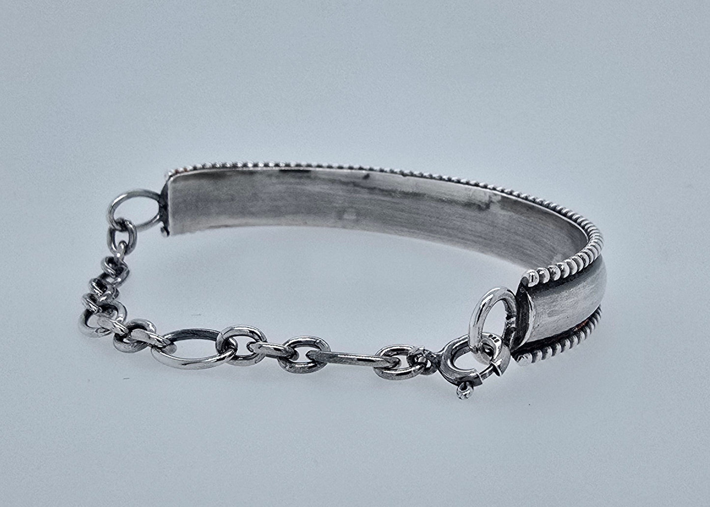 Zilveren armband, half massief en half ketting.