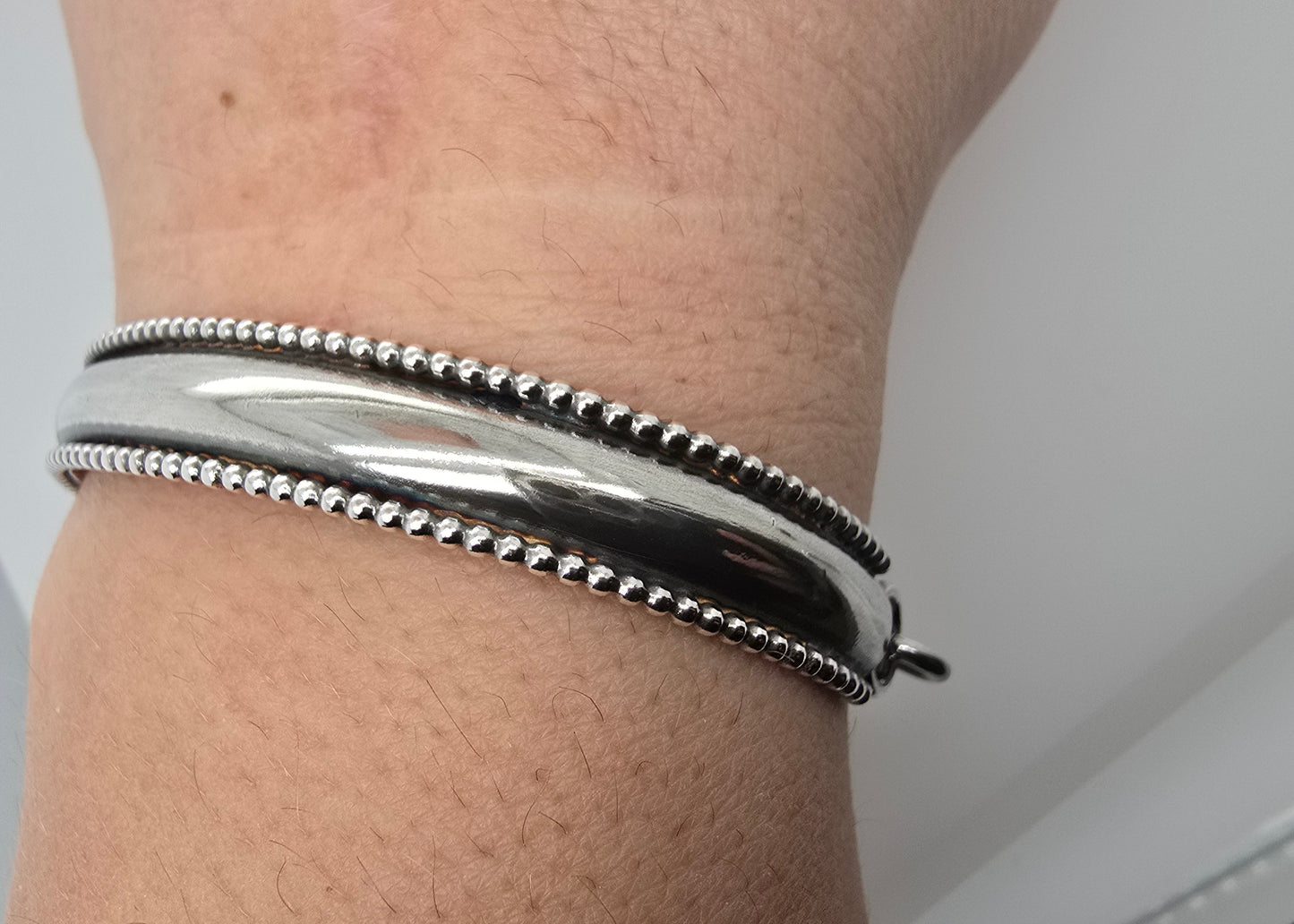Zilveren armband, half massief en half ketting.