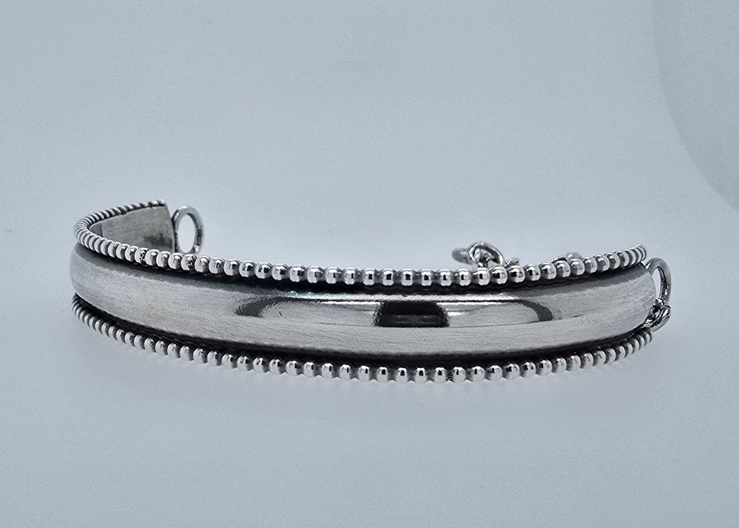 Zilveren armband, half massief en half ketting.